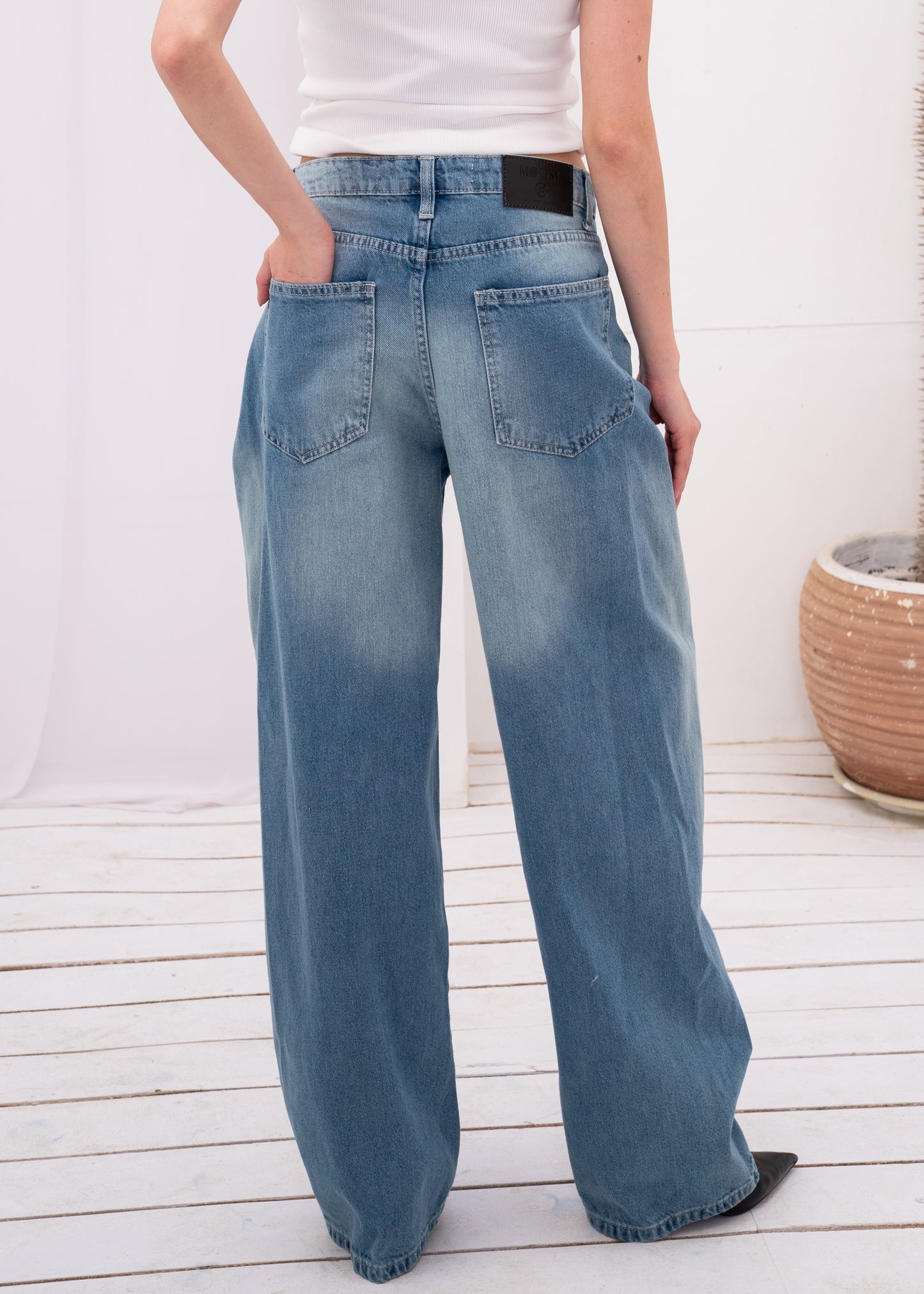 asymmetric wide jeans